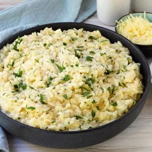 Parmesan Risotto Recipe: How to Make It Risotto Recipes Parmesan, Best Thanksgiving Sides, Italian Rice Dishes, Recipes With Wine, Risotto Recipes Easy, Quick Delicious Dinner, Coleslaw Recipe Easy, Parmesan Risotto, Best Thanksgiving Side Dishes