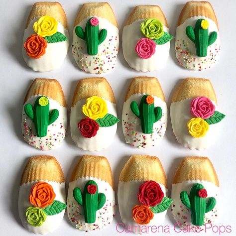 Dee Camarena on Instagram: “💗FRIDA Theme💗#madeleines #cookies #decorateddonuts #fancydonuts #ricekrispies #ricetreats #fridatheme #fridabanyshower #1stbday…” Mexican Theme Party Treats, Mexican Fiesta Cookies, Mexican Theme Treats, Mexican Theme Cupcakes, Mexican Themed Desserts, Mexican Theme Baby Shower Ideas, Mexican Baby Shower Theme, Floral Treats, 40th Fiesta