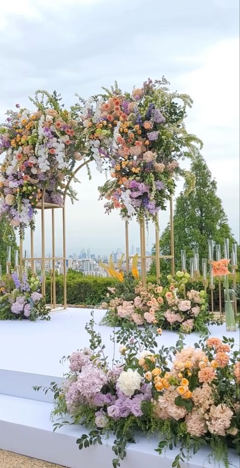 Lilac Wedding Ceremony, Rapunzel Aesthetic Wedding, Pastel Purple And Green Wedding, Bridgeton Themed Wedding, Lavender And Orange Wedding Theme, Pastel Mandap, Wedding Flowers Decoration, Peach And Purple Wedding Decorations, Lilac And Coral Wedding