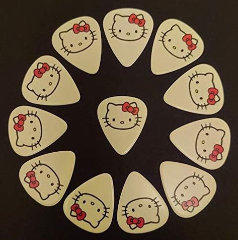 Amazon.com: Hello Kitty (Kitty White) Guitar Picks (12 Picks) - GET 3 FOR THE PRICE OF 2 : Musical Instruments Hello Kitty Guitar, Bass Guitar Accessories, White Guitar, Hello Kitty Images, Cool Electric Guitars, Hello Kitty Items, Kitty Kitty, Guitar Accessories, Guitar Picks