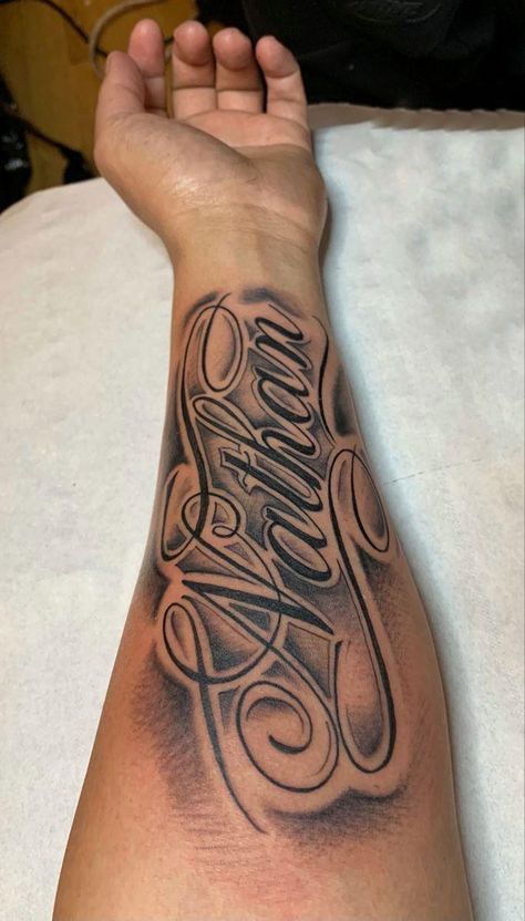 Name Style Tattoos, Arm Tattoos For Guys Forearm Ideas, Last Name On Arm Tattoo, Mom Name Tattoo Designs, Name Tattoo With Shading, Sleeve Tattoos With Names, Men Name Tattoos For Women, Men’s Name Tattoos, Name Sleeve Tattoo