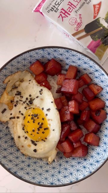 Christy Nguyen on Instagram: "Spam, Egg & Rice bowl This is a simple go to meal that I’ll whip up for the kids. It takes little effort to make this and my kids love wrapping this up in nori sheets. Ingredients: 1 can low sodium spam 1 tbsp low sodium soy sauce 1 tbsp brown sugar 1 tsp mirin 1 tsp furikake seasoning Fried egg Cut the Spam into cubes. In a hot pan, cook the spam until you get a golden brown color. Add soy sauce, sugar and mirin. Cook for additional 2 minutes and remove off he Spam And Eggs, Egg Rice Bowl, Nori Sheets, Egg Rice, Golden Brown Color, Nice Hair, Low Sodium Soy Sauce, Asian Kids, Rice Bowl