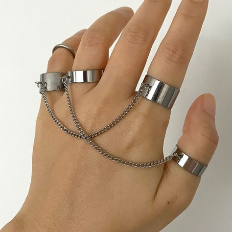 Introducing our edgy and unique punk-inspired stainless steel double ring with a trendy chain link detail. This statement piece is perfect for adding a touch of attitude to your look, whether you're heading to a concert or just wanting to stand out from the crowd. Made with high-quality stainless steel, these rings are not only stylish but also durable for everyday wear. Embrace your rocker side with this bold and versatile accessory! ▪️▪️▪️PRODUCT  Rustic Vampire Style Plain Double Rings Option Vampire Style, Ring With Chain, Punk Rock Jewelry, Gothic Mode, Double Rings, Grunge Accessories, Mode Grunge, Double Band Rings, Titanium Jewelry