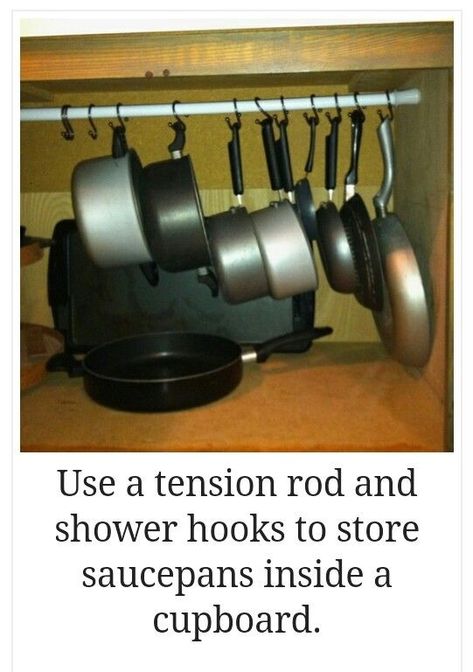 Use a tension rod to hang your pots and frying pans! Such a cool idea to consider to save space in your cabinets. #organization101  #kickinupthekitchen Pan Storage, Tension Rods, Diy Rangement, Kabinet Dapur, Kitchen Organization Diy, Diy Pots, Tension Rod, Organization Diy, Diy Kitchen Cabinets