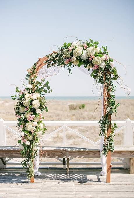 Amazing Ceremony Structures For Your Wedding | Wedding Ideas | Brides.com Diy Wedding Arch Flowers, Wedding Arch Decoration Ideas, Arch Decoration Ideas, Ceremony Styling, Beach Wedding Arch, Diy Wedding Arch, Floral Arch Wedding, Wedding Ceremony Arch, Wedding Arch Flowers