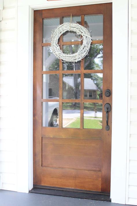 We loved White Buffalo Styling Co.'s front door already, but the wreath adds a touch of character that makes us like it even more! Craftsman Style Front Doors, Stained Front Door, Farmhouse Dark, Stained Wood Trim, Timber Front Door, Windows Interior, Front Door Lighting, Sliding Glass Doors Patio, Small Wreath