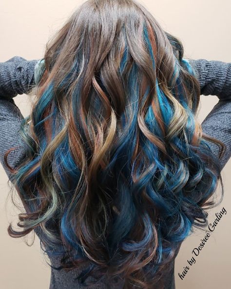 Brown Hair With Blonde And Blue Highlights, Brown And Blue Curly Hair, Turquoise Streaks In Hair, Brown Hair With Light Blue Highlights, Curly Hair With Streaks, Brown Blonde And Blue Hair, Brown And Dyed Hair, Blue Highlights In Brown Hair Curly, Blue And Blonde Highlights