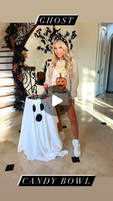 Macy Blackwell on Instagram: "Lit Ghost Candy Bowl!👻🍫🍬 Super cute for trick-or-treating on Halloween night, or to display as decor! Easy, non-permanent, so nothing to have to store after Halloween!

Sweatshirt is from my Halloween Collection launching Sept 23rd at Pink Lily! 🎃

Supplies needed: 

- backless stool
- large bowl 
- duct tape 
- white bedsheet 
- black stick on felt 
- strand of white lights 
- Halloween candy! 

1. Tape a large bowl onto a stool. 
2. Wrap around white lights around the stool
3. Toss over a white bedsheet 
4. Add on the black felt for eyes and mouth
5. Add candy into the top of the bowl! 

#halloweendiy #halloweendecor #halloweenideas #candybowl" Trick Or Treat Candy Display, Trick Or Treat Bowl, Trick Or Treat Candy Bowl, Ghost Candy Bowl, Halloween Party Planning, Vegan Halloween, Halloween Science, Easy Christmas Decorations, Autumn Decorating