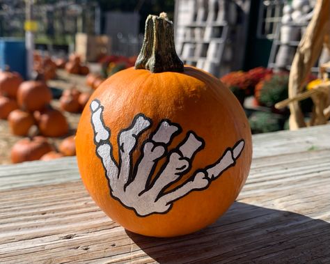 Pumpkin Painting Skeleton, Skeleton Pumpkin Painting Ideas, Skeleton Painted Pumpkin, Painted Mini Pumpkins Ideas, Small Painted Pumpkins, Skeleton Pumpkin Painting, Painting Mini Pumpkins, Hang Loose Skeleton Hand, Small Pumpkin Painting