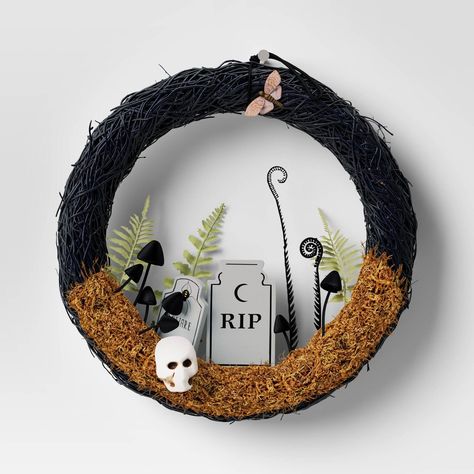 Bring a touch of haunted charm to your seasonal decor with this 16-Inch Twig Halloween Scene Wreath Tombstone from Hyde & EEK! Boutique™. This Halloween wreath features a circular design of black twigs adorned with a brown butterfly at the top and an 'RIP' tombstone surrounded by black mushrooms, green twigs and a white skull on brown moss at the bottom, creating a frightfully festive scene. Hyde & EEK! Boutique™: Thrilling delights. Curious oddities. Black Mushrooms, Rip Tombstone, Boho Crafts, Brown Butterfly, Halloween Tombstones, Boho Crafts Diy, Target Holiday, Halloween Lanterns, Halloween Garland