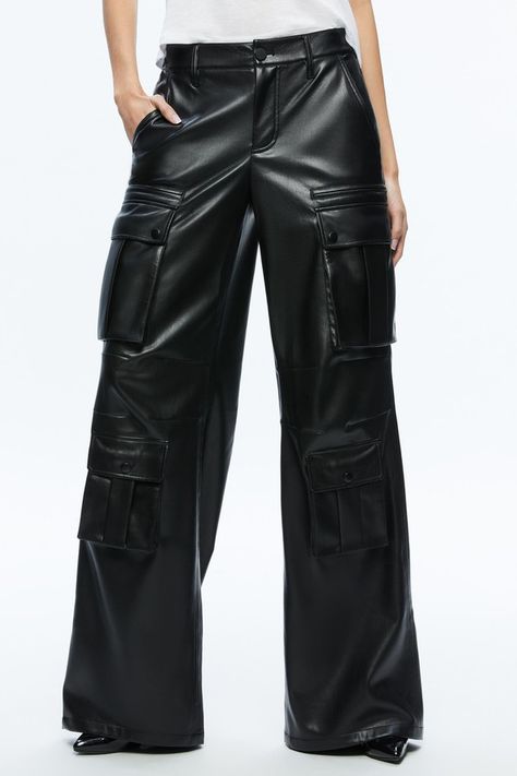 Find ALICE + OLIVIA Joette Vegan Leather Cargo Pant on Editorialist. Description One of our favorite silhouettes of all time, in chic vegan leather. With a wide straight leg, cargo design and easy fit this takes a classic to a whole new level. Details Cargo pants Full length Vegan leather Low rise Elastic waistband Front button and zipper closure 100% polyester Dry clean only Imported Fit Front rise: 9 1/2 Back rise: 14 3/4 Inseam: 34 1/2 Fits true to size, take your normal size Model is wearing a size 25 and her measurements are 59.5, 31 bust, 23 waist, 34.5 hip Low Waisted Leather Pants, Cargo Pants With Sneakers, Best Cargo Pants, Leather Cargo Pants, Cargo Design, Latest Designer Dresses, Metallic Leggings, Leather Midi Skirt, Wardrobe Update