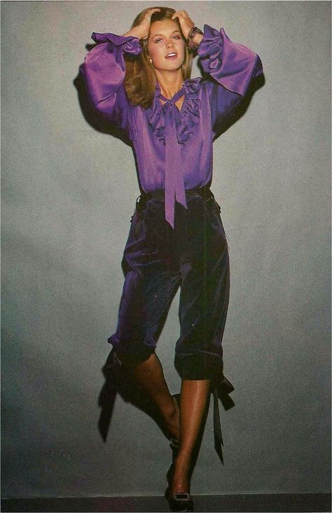 YSL, Harper's Bazaar October 1979.....remember knickers?!  Wow, around this time if you didn't have a pair to these puffy short pants you totally out of it!  haha fun :o) 70s 80s purple velvet silk bow top model magazine vintage fashion style pedal pushers 70s Fashion For Women, Classic Fashion Pieces, Gia Carangi, Ysl Vintage, Ysl Saint Laurent, 1970's Fashion, Model Magazine, Pedal Pushers, Disco Era