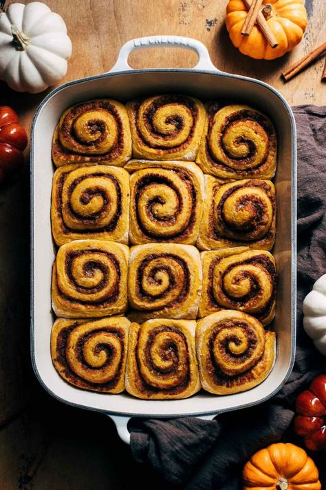 These pumpkin cinnamon rolls are so soft and fluffy with a pumpkin dough and pumpkin butter filling. With flavors of pumpkin spice, cinnamon, and vanilla bean cream cheese frosting, these pumpkin cinnamon rolls are the coziest fall treat! #pumpkinspice #pumpkin #cinnamonrolls #butternutbakery | butternutbakeryblog.com Pumpkin Dough, Pumpkin Spice Cinnamon Rolls, Vanilla Bean Cream, Fluffy Cinnamon Rolls, Cinnamon Roll Dough, Cinnamon Rolls Easy, Pumpkin Cinnamon Rolls, Pumpkin Butter, Easy Cinnamon