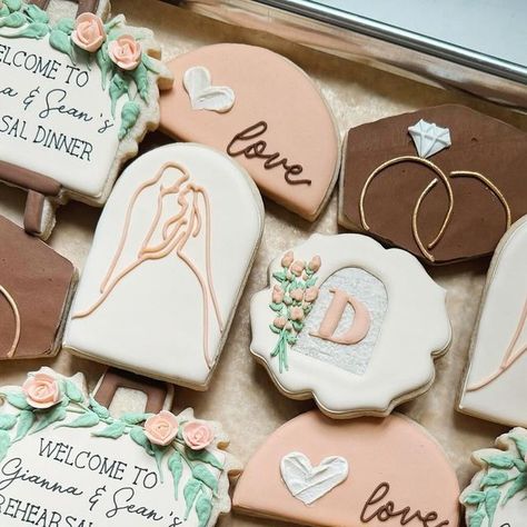 Cookies By Gi on Instagram: "Feels like we blinked, and now we’re at our rehearsal dinner🩷 Just two days until I marry my love! • • • #rehearsaldinnercookies #weddingmorningcookies #thenightbeforecookies #weddingringcookies #floralsigncookies #signcookies #brideandgroomcookies #initialcookies #personalizedcookies #customcookies #sugarcookies #sugarcookiesofinstagram #decoratedsugarcookies #decoratedcookies #talentedcookiers #edibleart #cookieset #weddingcookies #earthtonecookies" Rehearsal Dinner Cookies, Engagement Cookies, Cookies Wedding, Floral Signs, Personalized Cookies, Heart Cookies, Wedding Cookies, Guest Book Alternatives, Morning Wedding