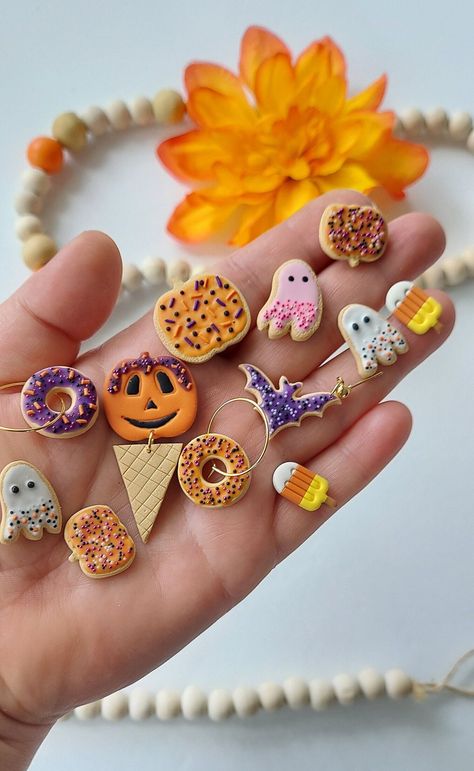 Halloween Cookies Collection made special for you! Handmade by me from scratch using high quality Polymer Clay.  Perfect for Spooky season. Give as a gift or treat yourself.  Most styles can be made in dangles with ( hoops, fish hook, ball shaped post. ) Just message me and i will be happy to help. Due to the handcrafted nature of these earrings,  slight variations in color + shape may occur- making each pair unique in their own way !  Please keep im mind -while I try my absolutly best to make e Fall Clay Earrings, Cookie Earrings, Polymer Clay Halloween, Halloween Clay, Diy Earrings Polymer Clay, Halloween Cookie, Polymer Clay Ornaments, Earrings Fall, Clay Diy Projects