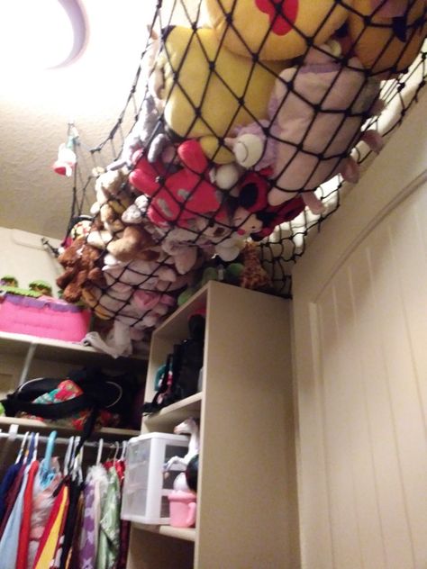 Have lots of stuffed animals taking up space? Get a cargo net and hang it from the ceiling as a simple and easy solution! (Make sure there is an adult helping with the project.) Cargo Net Stuffed Animal Storage, Stuffed Animal Ceiling Net, Playground Bedroom, Lots Of Stuffed Animals, Stuffy Storage, Plush Net, Storing Stuffed Animals, Stuffed Animal Net, Stuffed Animal Holder