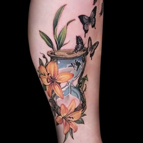 Pretty hourglass and floral tattoo done by @katarina.heinze!! Those butterflies are also eye-catching! ⌛️🦋 "Fun one for this beauty! I enjoyed doing such a colourful piece for her!⁠" - Katja Realism Tattoos, Mama Tried, Hourglass Tattoo, Floral Tattoos, Realism Tattoo, Best Tattoo, Awesome Art, Tattoo Inspo, Tattoo Idea