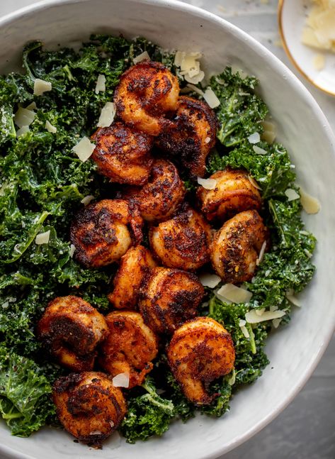 This blackened shrimp kale caesar is loaded with flavor. Spiced, buttery shrimp pan fried until golden, then thrown on kale caesar salad. Delish! Kale Shrimp Recipes, Cesar Salad With Shrimp, Kale Shrimp Salad, Shrimp Kale, Shrimp Ceasar Salad Recipes, Shrimp Arugula Salad, Kale Caesar, Shrimp Ceased Salad, Dinner With Kale