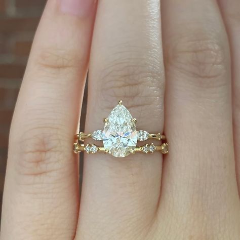 Pear Cut Moissanite Wedding Ring Set 2CTW D Engagement Ring Set Bridal Ring Set Check more at https://beautyfashionideas.com/bridal/pear-cut-moissanite-wedding-ring-set-2ctw-d-engagement-ring-set-bridal-ring-set/ Wedding Ring Sets Teardrop, Moissanite Bridal Ring Sets, Salt And Pepper Diamond Ring Set, Pear Shape Engagement Ring Stack, Pear Cut Moissanite Engagement Ring, Unique Engagement Rings Gold Band, Wedding Band For Pear Shaped Ring, Pear Engagement Ring Stack, Pear Engagement Ring With Wedding Band