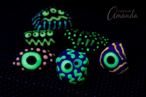 These Glow in the Dark Monster Rocks have just the right amount of spooky. They’re a great craft for a … Simple Rock Painting Ideas, Simple Rock Painting, Beltane Ritual, Rock Painting Ideas For Kids, Glow In The Dark Rocks, Adapted Art, Glow Rock, Monster Rocks, Painting Ideas For Kids