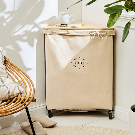 Steele Canvas Basket Corp on Food52 Elevated Laundry, Corner Laundry, Laundry Basket On Wheels, Steele Canvas, Kitchen With Big Island, Baskets With Lids, Canvas Basket, Italian Bedroom Furniture, Laundry Basket With Lid