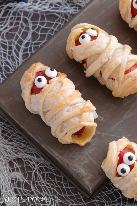 Mummy Hot Dogs Puff Pastry, Mummy Pigs In A Blanket, Halloween Finger Food Ideas, Halloween Finger Food, Puff Pastry Recipes Appetizers, Mummy Hot Dogs, Homemade Crescent Rolls, Finger Food Ideas, Halloween Finger