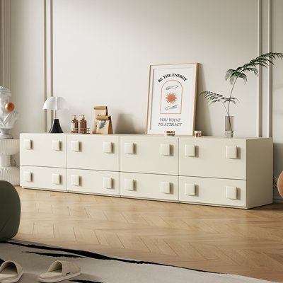 It is both beautiful and practical Color: Cream | jessica 91.33" W Storage Credenza Wood in Brown | 19.68 H x 91.33 W x 14.56 D in | Wayfair Credenza Wood, Toy Cabinet, Low Storage, Basement Office, Square Arm Sofa, Teen Decor, Teen Bedroom Furniture, The Smith, Door Hardware Interior