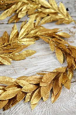 28.00 SALE PRICE! Wrap this golden Bay Leaf Garland around sparkling mercury glass candle holders on your mantel or wedding reception tables. This stunning m... Gold Party Aesthetic, Bay Leaf Garland, Battery Christmas Lights, Beech Leaf, Gold Garland, Mercury Glass Candle Holders, Royal Ball, Gold Party Decorations, Party Aesthetic