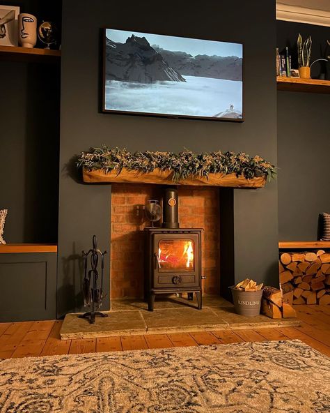 We’re quite often asked about where our TV is in the living room - that’s it above the fire! It’s the frame tv by Samsung. You can set the… | Instagram Scottish Living Room, Brick Fireplace Log Burner, Above Fireplace Ideas, Oak Beam Fireplace, Cottage Lounge, Tv Above Fireplace, Log Burner Living Room, Cottage Fireplace, Snug Room