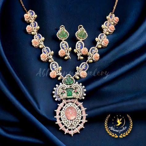 “Vibrant Elegance Add a pop of color to your party look with this stunning peacock and floral design color stone necklace set in 92.5 pure silver from Abharan Jewelry. Premium quality and expert craftsmanship ensure a luxurious finish, while the vibrant color stones and intricate design make a statement. Perfect for parties, special occasions, or everyday wear, this necklace set is a true showstopper! Details: · Peacock and floral design for a unique and eye-catching look · Color stones ... Colour Stone Pendant, Bridal Shower Bachelorette Party Ideas, Color Stones Jewelry, Stone Necklace Set, Stone Jewellery, Polki Necklace, Colour Stone, Color Stones, Party Look