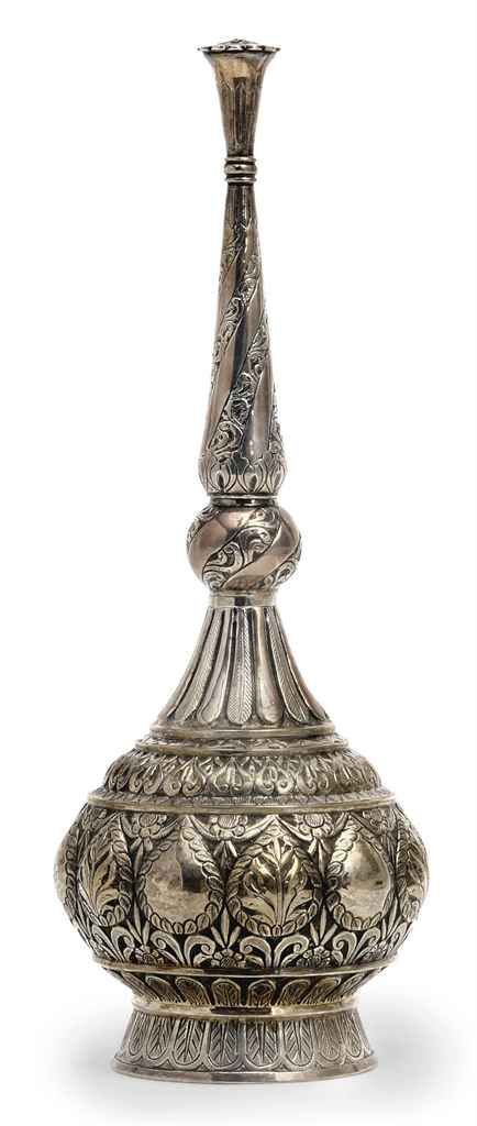 A LARGE OTTOMAN SILVER-REPOUSSÉ ROSEWATER SPRINKLER  TURKISH CULTURE 18TH/19TH CENTURY  With floral medallions and garlands Ottoman Silver, Large Ottoman, Turkish Culture, Antique Perfume Bottles, Antique Perfume, Turkish Art, Islamic World, Moroccan Decor, Ottoman Empire