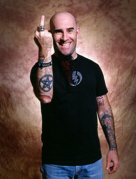 Who said Jews can’t rock? For proof, look no further than Scott Rosenfeld (aka Scott Ian, Anthrax) and Saul Hudson (aka “Slash“) who have been known to munch on the matzoh from time to time. It’s also common knowledge that David Lee Roth (ex-Van Halen) is a world champion dreidel spinner who would give Gene … Scott Ian 80s, Scott Ian, Dimebag Darrell, Best Guitarist, Heavy Rock, Musica Rock, All About Music, Thrash Metal, Foo Fighters