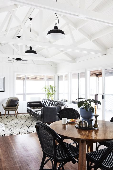 Black And White Beach House, Black Leather Sectional, White Beach House, Garage Guest House, Black And White Beach, Beach Road, Home Magazine, White Beach, Timber Flooring