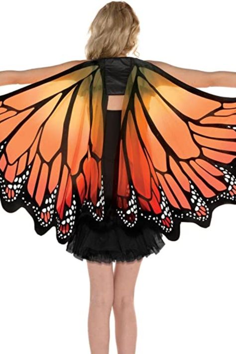 Flutter into the costume party with style wearing this monarch butterfly wings orange festival outfit for women! These polyester wings feature black, Orange, and white designs made to look like monarch wings. The wings have attached loops at the ends to easily slip your hands through. Pair these monarch butterfly wings with an all-black outfit they will add a vibrant touch to any butterfly costume! Headband, dress, and Shoes not included. Diy Butterfly Wings Costume, Butterfly Rave Outfit, Hoco Outfits, Rave Outfits Diy, Monarch Butterfly Wings, Halloween Birthday Parties, Butterfly Wings Costume, Headband Dress, Costumes For Halloween