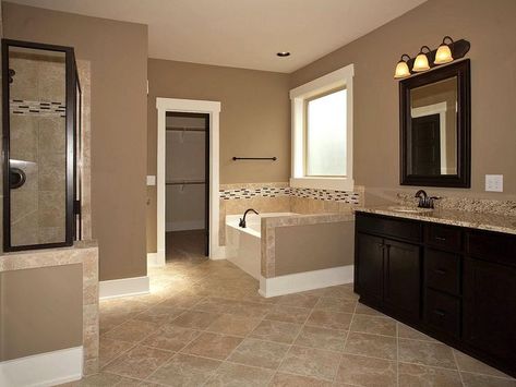 Master Bathroom-Add tile flooring, frame the mirror, stain the cabinets, change light fixtures-all to look more like this! Bathroom Brown Tile, Warm Bathroom, Brown Bathroom Ideas, Brown Tile, Large Bathroom, Bathroom Color Schemes, Bathroom Paint Colors, Brown Bathroom, Bathroom Color