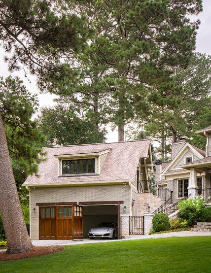 Carriage House: Inside an Atlanta Carriage Home Addition Brick Carriage House Garage, Garage Kitchenette, Carriage House Interior, Carriage House Apartments, Steel French Doors, Carriage House Garage, Carriage House Plans, Garage Addition, House Balcony