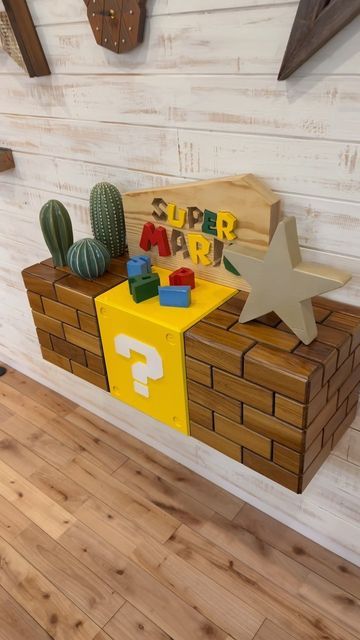 Super Mario Gaming Room, Mario Shelf Diy, Mario Nightstand, Mario Blocks Diy, Super Mario Bros Bedroom Ideas, Mario Theme Room, Mario Kart Room, Mario Room Ideas, Super Mario Room Ideas Boys