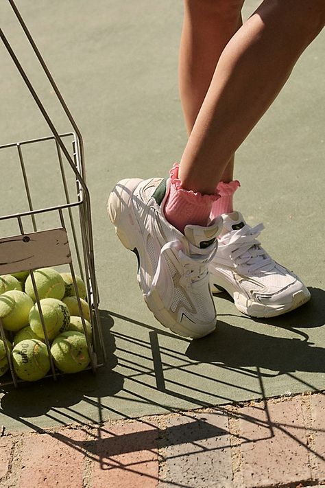 So comfy socks featured in an ankle rise style with ruffle edge detailing. * Ribbed knit * Seamed toe | Movement Classic Ruffle Socks by FP Movement at Free People, Bubblegum Ruffle Socks With Sneakers, Socks With Sneakers Outfit, Ruffle Socks Outfit, Coquette Tennis, Ankle Socks Outfit, Ruffle Sock, Socks With Sneakers, Socks Photoshoot, Emma Core