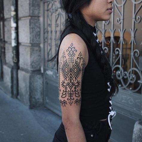 Black ornamental tattoo inked on the right upper arm Black Ornamental Tattoo, Related Tattoos, Cage Tattoos, Belly Tattoos, Ribcage Tattoo, Ancient Tattoo, Ornamental Pattern, Epic Tattoo, Cool Arm Tattoos