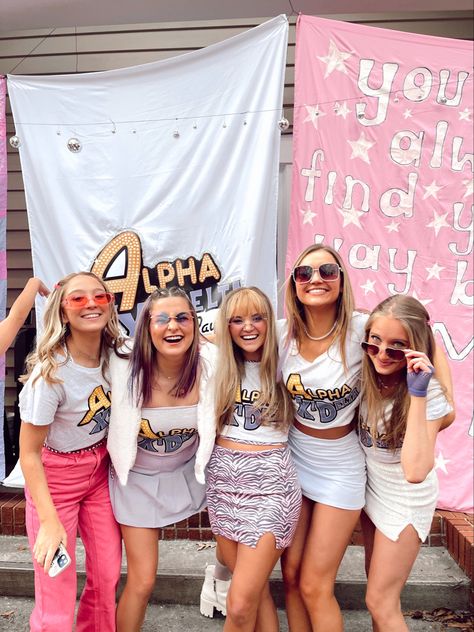 bid day theme for sorority girls. pink pants and cool sunglasses, hannah montana, Hannah Montana Themed Bachelorette Party, Hannah Montana Themed Party, 2000s Bid Day Theme, Hannah Montana Bachelorette Party, Hannah Montana Bid Day, Hannah Montana Party, Bid Day Themes Sorority, Hannah Montana Shirt, Sorority Themes