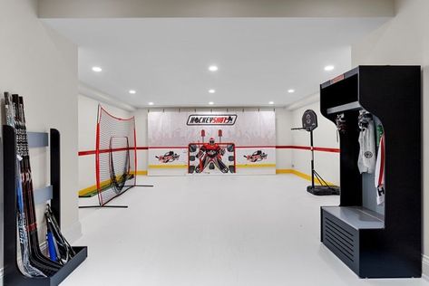 Hockey Training Room, Hockey Playroom, Hockey Garage, Sports Playroom, Basement Hockey, Hockey Basement, Hunters Bedroom, Hockey Themed Room, Hockey Man Cave