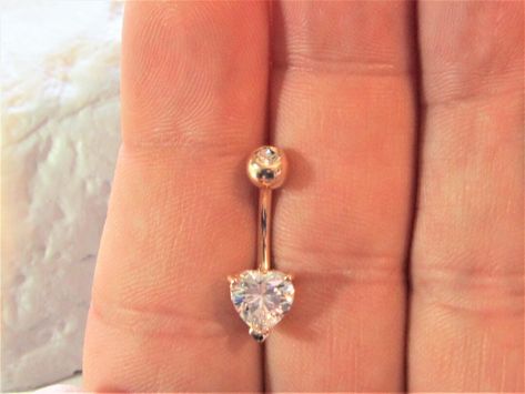 Buy Rose Gold Plated Surgical Steel Heart Cz Belly Button online on Etsy India. Shop for handmade, vintage and unique Belly Rings items from XSBodyJewelry online on Etsy Unique Belly Rings, Ear Piercings Industrial, Belly Button Piercings, Belly Piercings, Bellybutton Piercings, Belly Button Piercing Jewelry, Piercings Ideas, Belly Piercing Ring, Belly Piercing Jewelry