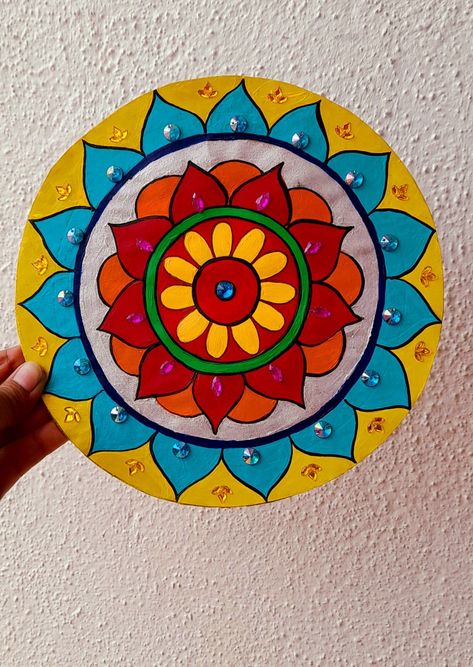 Mandala artwork with paint🎨🖌️ Drawing On Cardboard Artworks, Rangoli Painting On Canvas, Easy Round Rangoli Design, Paper Plate Decoration Ideas, Rangoli Mandala Designs, Cd Mandala Art, Mandala Ceiling, Wall Plates Decor Diy, Rangoli With Paint