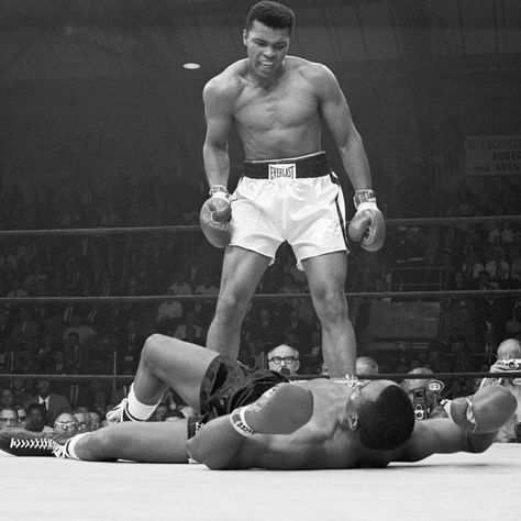 Esquire on Instagram: “On This Day: May 25, 1965, Heavyweight champion Muhammad Ali stands over Sonny Liston and taunts him to get up during their title fight.…” Muhammad Ali Wallpaper, Ali Wallpaper, Historical Wallpaper, Ali Boxing, Sonny Liston, Floyd Patterson, Muhammad Ali Boxing, Mohammad Ali, Hbo Documentaries