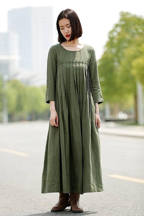 Versatile and stylish, this is a linen dress that youll wear again and again. Loose-fitting for ultimate comfort with gorgeous pintuck pleated details on the bodice, this linen dress is super feminine. Simple enough in design but unique enough to be noticed. As people care more and more Sewing Dresses For Women, Kain Linen, Green Linen Dress, Linen Dress Women, Long Linen Dress, Dress Pleated, Dress Linen, Linen Maxi Dress, Linen Dresses