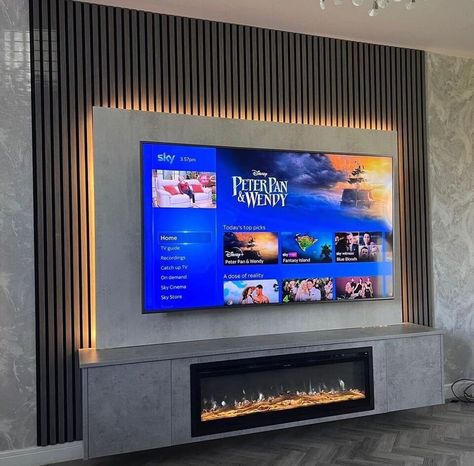 Introducing our Media Wall Package featuring a sleek 40" Electric Fire: *Enhance your space with 4 acoustic panels, totalling a width of 2.4m (each panel: 60cm W x 240cm H). *Accompanied by a 200cm wide floating unit, inclusive of a 40'' Electric fire and 2 Doors. *A dedicated TV panel, suitable for screens up to 75" *Complete with an LED Light Kit for added ambiance. Customization is key with: *Hundreds of colour options available for our units and TV panels. *Eight colour choices for our acous Diy Media Wall, Wall Units With Fireplace, Tv Wall Panel, Modern Electric Fireplace, Built In Electric Fireplace, Feature Wall Living Room, Tv Wand, Modern Tv Units, Fireplace Set