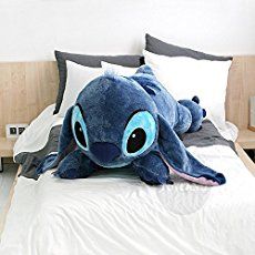 Get your snuggle on with this super sized Stitch Pillow, that is almost as big as a person! This humongous Stitch pillow is also a great statement piece in a bedroom for extra Disney flair. Inspired by Disney’s Lilo and Stitch, Hawaii’s favorite extra-terrestrial creature becomes a soft and cuddly keeper with this Stitch Pillow. Don’t … Gru Body Pillow, Stitch Disney Bedding, Disney Stitch Plush Pattern, Stitch Disney Teddy, Stitch Plush Disney, Stitch Plush Walmart, Lilo And Stitch Toys, Stitch Stuffed Animal, Lilo Und Stitch