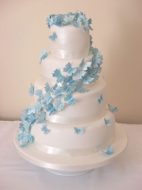 Blue butterfly wedding cake Light Blue Quinceanera Ideas Butterfly, Qencenera Cakes, Light Blue Butterfly Cake, Baby Blue Butterfly Quinceanera Theme, Light Blue Butterfly Quinceanera Theme, Quince Cakes Blue, Baby Blue Quince Dresses, Blue Butterfly Cake, Butterfly Quince Theme