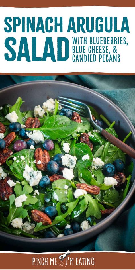 This easy arugula spinach salad recipe uses a simple balsamic vinaigrette and is topped with blueberries, blue cheese, and candied pecans. A perfect side salad, or try it with chicken for a light lunch or healthy dinner! Spinach And Arugula Salad, Blueberry Spinach Salad, Salad With Blueberries, Simple Balsamic Vinaigrette, Cheese Salad Recipes, Honey Balsamic Vinaigrette, Easter Pie, Arugula Salad Recipes, Blueberry Salad