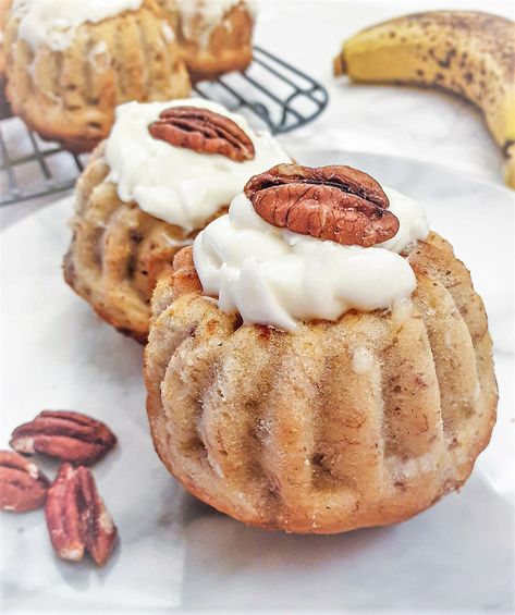 I’m totally in love with these mini pecan and banana bundt cakes with a tangy lemon flavoured cream cheese frosting. They make a nice change from the normal banana bread that we always seem to make when we have spotty old bananas to use up. The pecan nuts add an element of crunch and the... Read More The post Mini pecan and banana bundt cakes with lemon cheese frosting appeared first on Foodle Club. Banana Nut Mini Bundt Cakes, Flavoured Cream Cheese, Bundt Cake Cream Cheese Frosting, Cakes With Lemon, Lake Cake, Cake Bundt, Banana Bundt Cake, Banana Bundt, Bundt Recipes